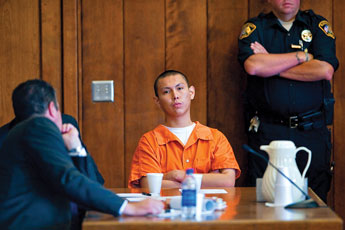 Accused killer Alex Redhorse sits at the defense table during a preliminary hearing at the McKinley County Courthouse Friday. &copy; 2011 Gallup Independent / Cable Hoover 